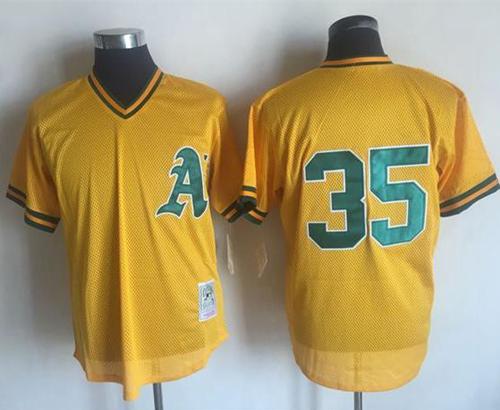 Mitchell And Ness 1984 Athletics #35 Rickey Henderson Yellow Throwback Stitched MLB Jersey Mitchell And Ness 1984 Athletics #35 Rickey Henderson Yellow Throwback Stitched MLB Jersey