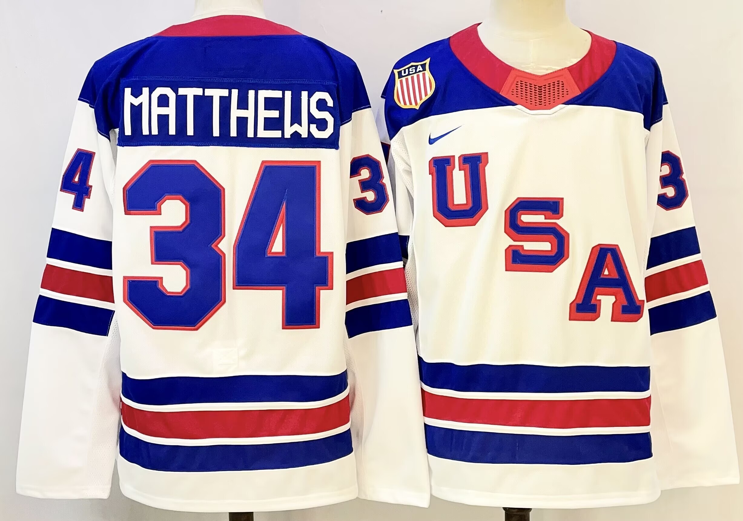 Men's USA #34 Auston Matthews White 2025-2026 Stitched Jersey Men's USA #34 Auston Matthews White 2025-2026 Stitched Jersey